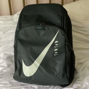 Dark green Nike backpack